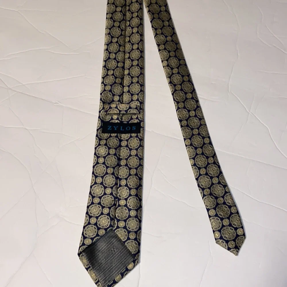 Zylos neck tie navy blue with gold medallion design.